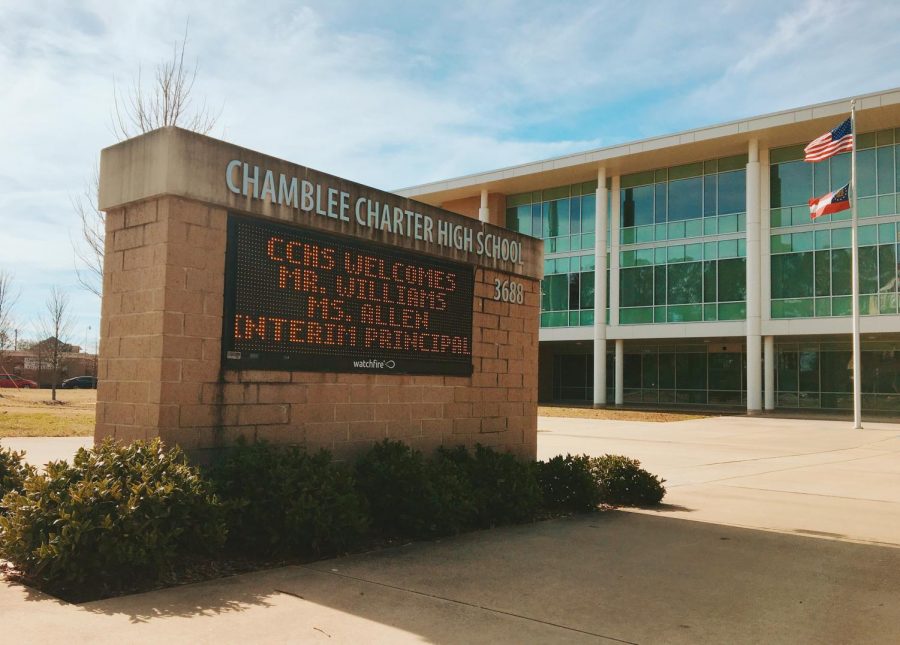 The sign in front of the school displays the new principals names.