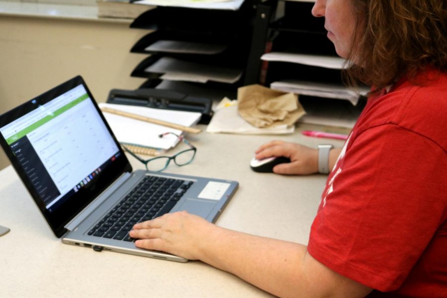 English teacher Jennifer Andriano visits Infinite Campus, used to view and input student grades.