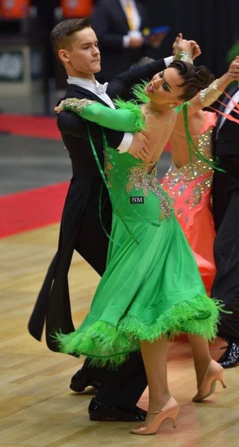 Madeleine Mravkarov dances with her partner in USA Ballroom National Championships.