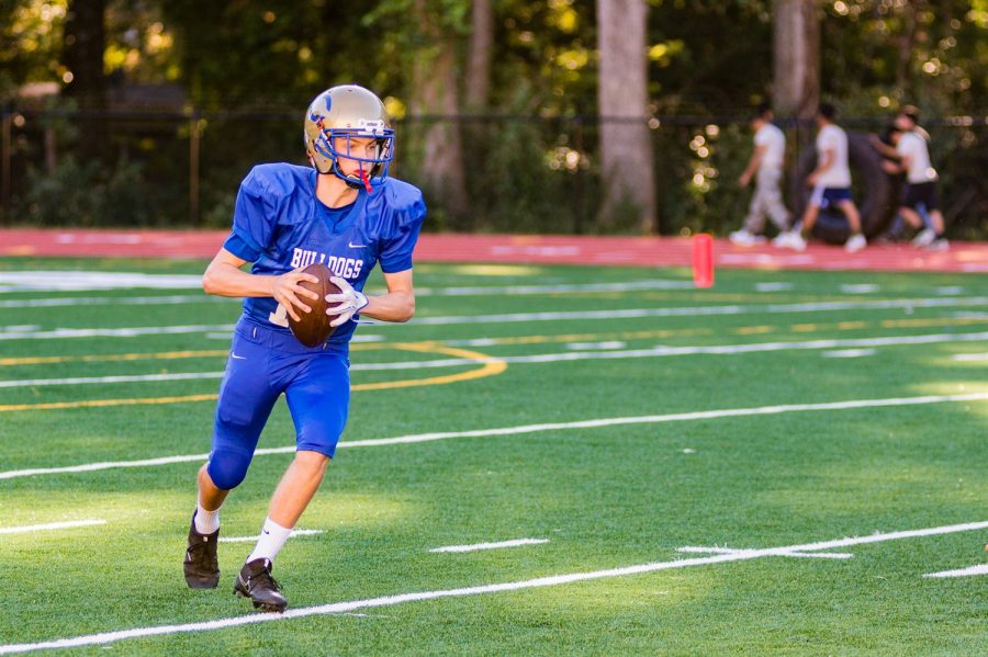 Quarterback Finn Allers playing football prior to his injury.  