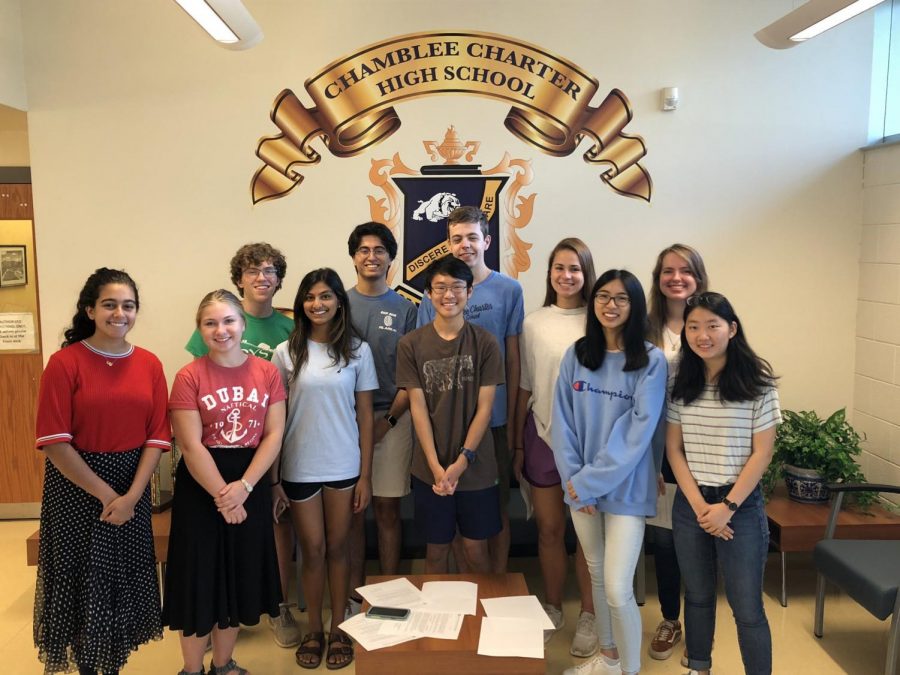 NMSQT Semi-Finalists pose for a picture. (From left to right: Layla Dhabaan, Emily Adams, Hudson McGaughey, Ritu Reddy, Anish Jaisinghani, Connor Lin, Drew Council, Debbie Kitzler, Shanru Xu, Brenna Turner, Rachel Choi)