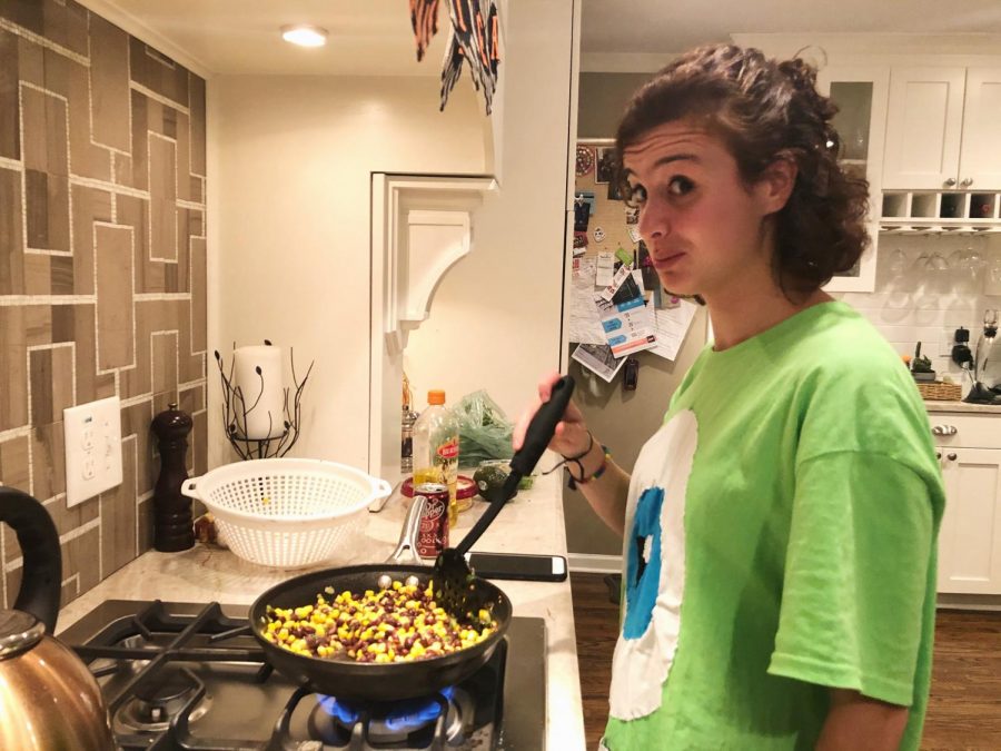 GSU Signal writer and Vegan Maya Torres whips up some corn and beans for a vegan taco.