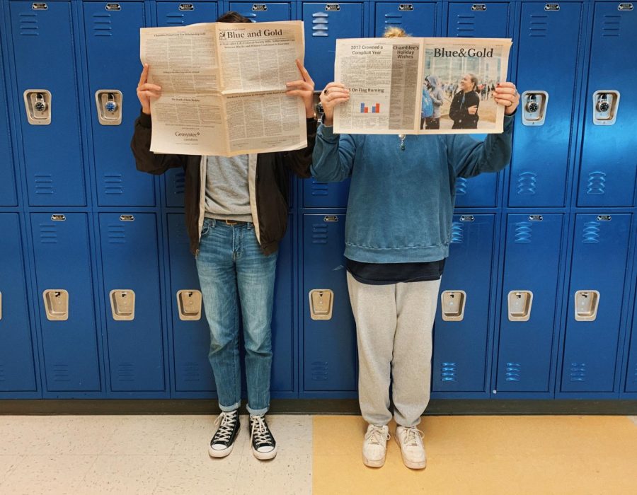 Editors Foster Cowan and Stella Garrett hold up some copies of The Blue & Gold.