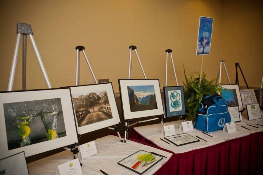 A view of a table of auctioned items from the Blue and Gold Silent Auction in past years.