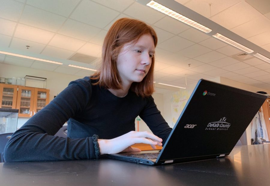 Senior Emery Wahlen uses her Chromebook in class, despite having trouble with the devices performance previously.