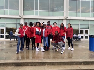 Chamblee's Be.U. members wear red, an important color in the Pan-African flag.