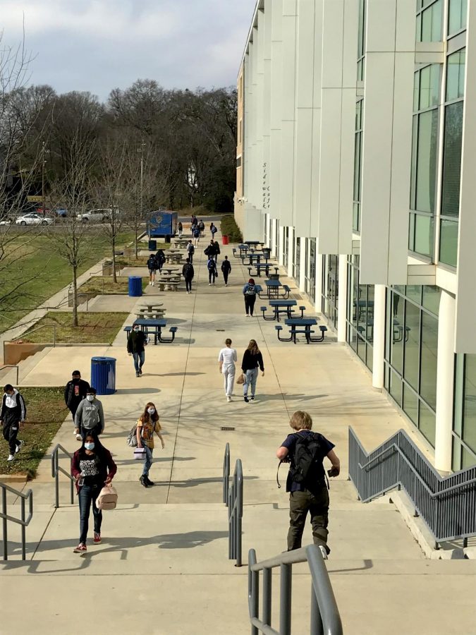 Students traverse the grounds of Chamblee High School.