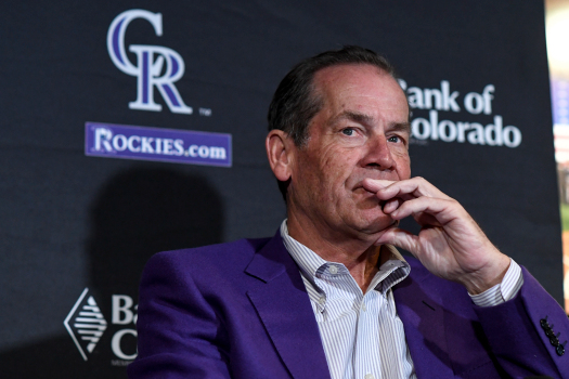 Rockies owner Dick Monfort looks on during a press conference.