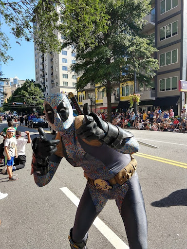 One cosplayer of the Marvel character Deadpool at the Dragon Con Parade in 2019