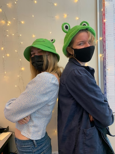 Seniors Natalie Brown (left) and Carly Aitken (right) posing in their frog hats for hat day