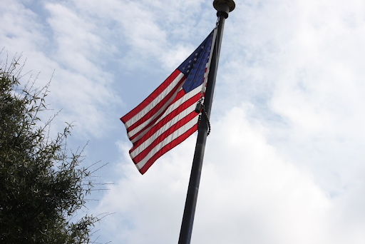An American flag waves in the wind in Chamblee