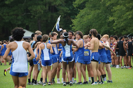 The team celebrates after the Bob Blastow Invitational on August 28