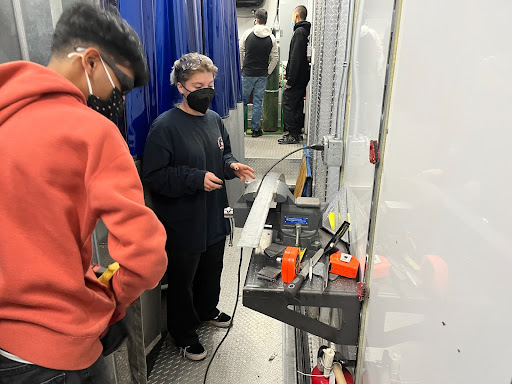 Students begin the process of welding