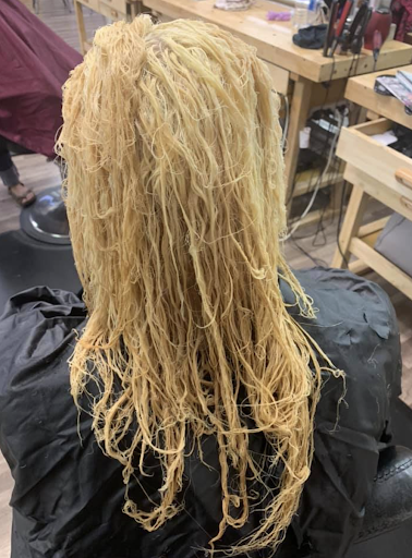A girls hair turned into the texture of rice noodles with the help of bleach