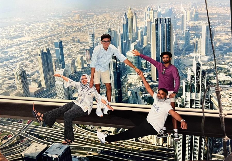 Ms. Begum and her family posing during a trip to the worlds tallest building in Dubai.