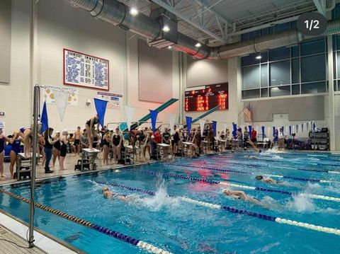 The swim team lines up for their first meet.