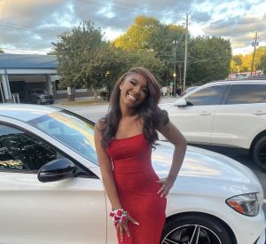Laila Paris poses in her outfit for the Chamblee 2022 Homecoming Dance.