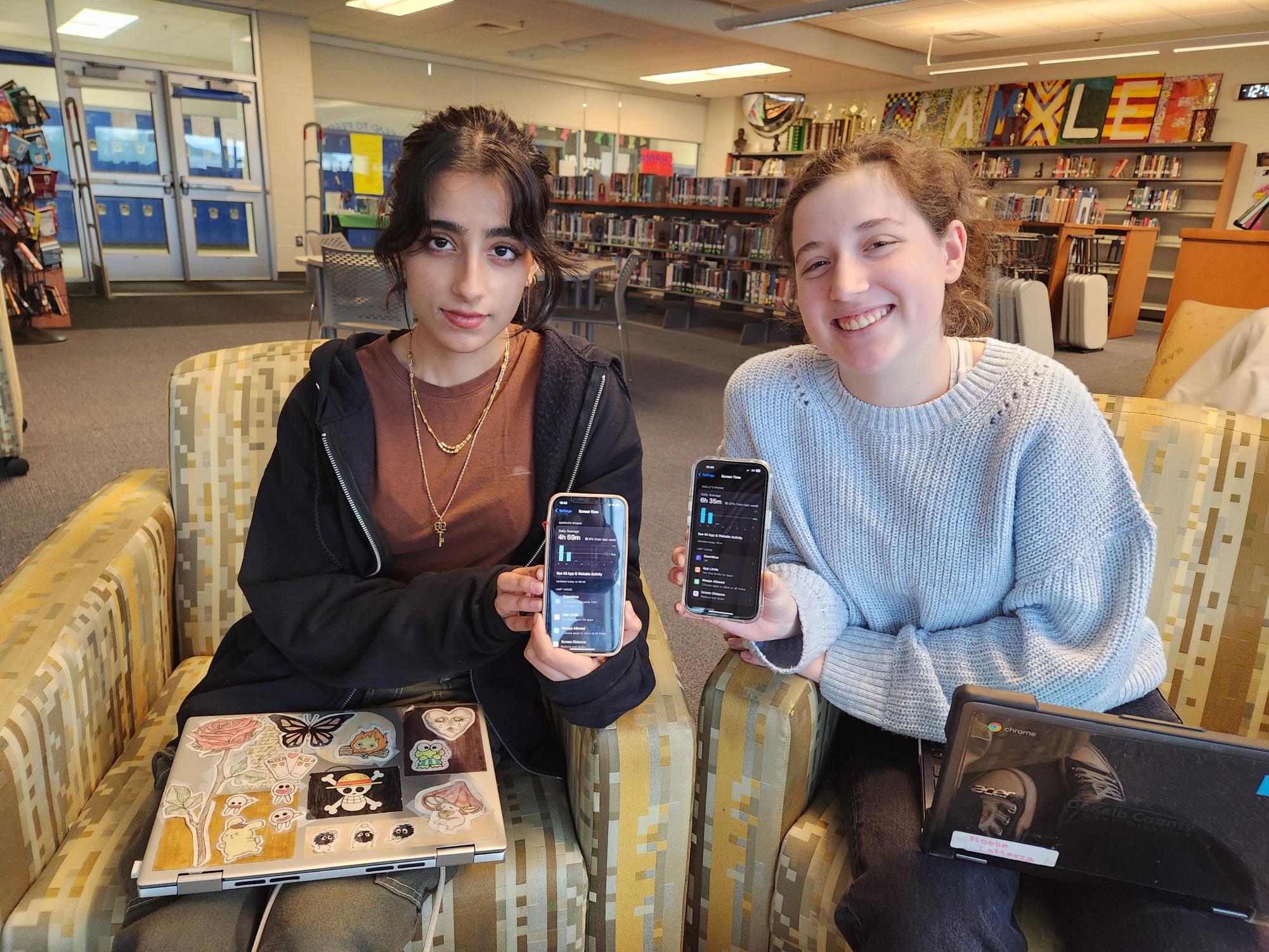 Students Madiha Sayeed and Noelle LaMarca showing their screen time.