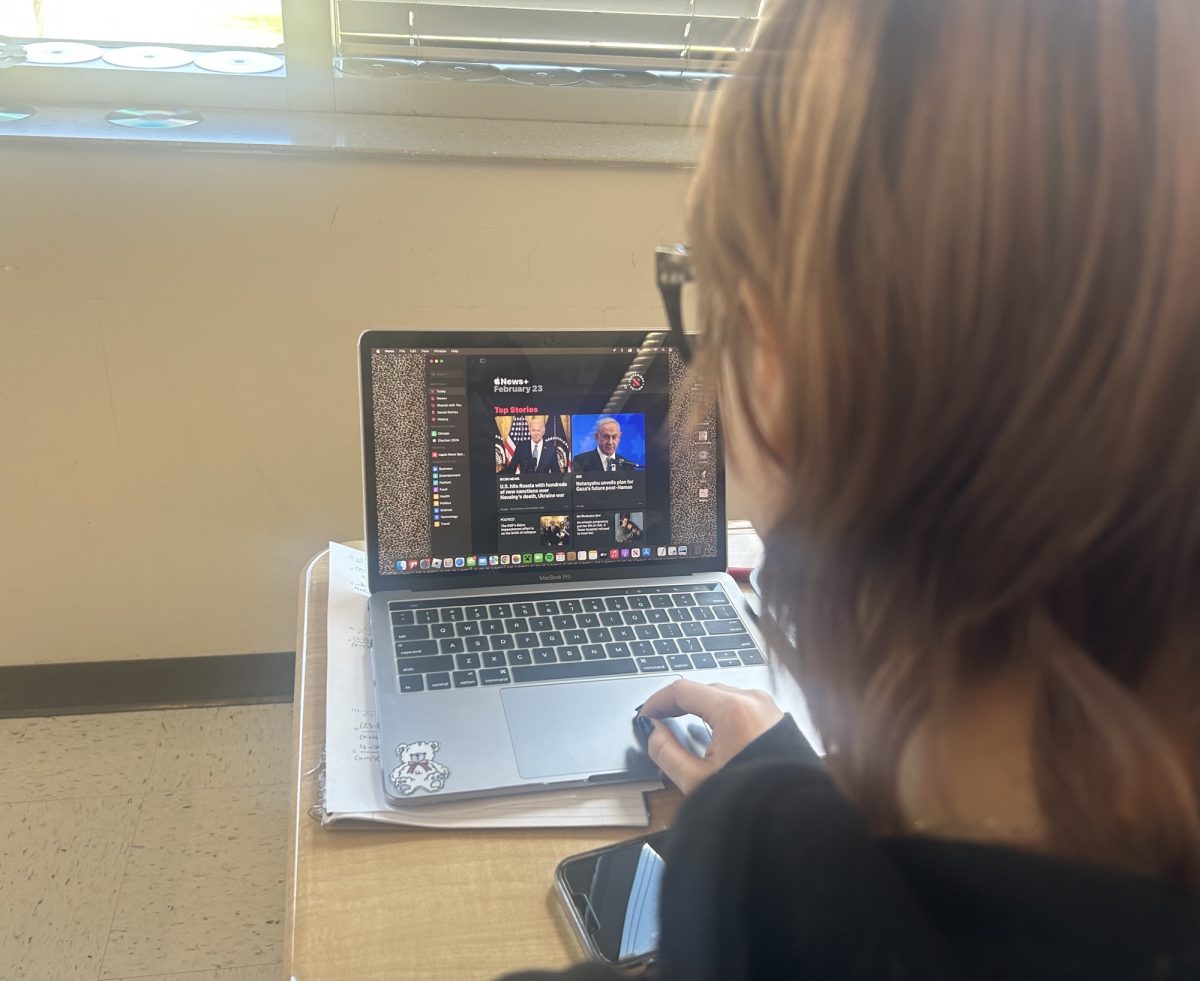 A+Chamblee+student+checking+the+daily+news.+Photo+courtesy+of+author.
