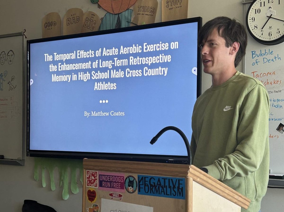 AP Research presentation given by Matthew Coates (‘24) about the temporal effects of acute aerobic exercise on the enhancement of long-term retrospective memory in high school male cross country athletes. Photo courtesy of Lyvia Huang (‘25).