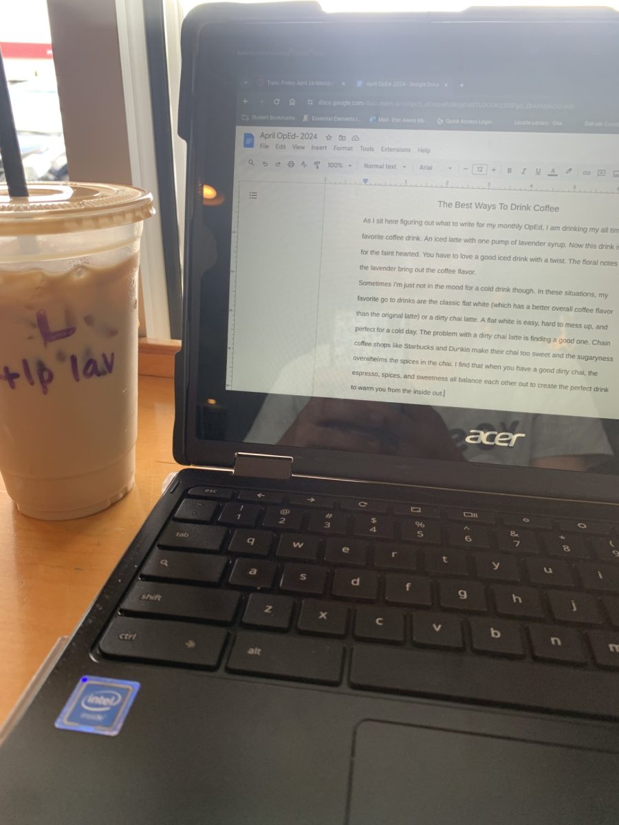 Erin (the author) drinking her iced latte while writing her article.