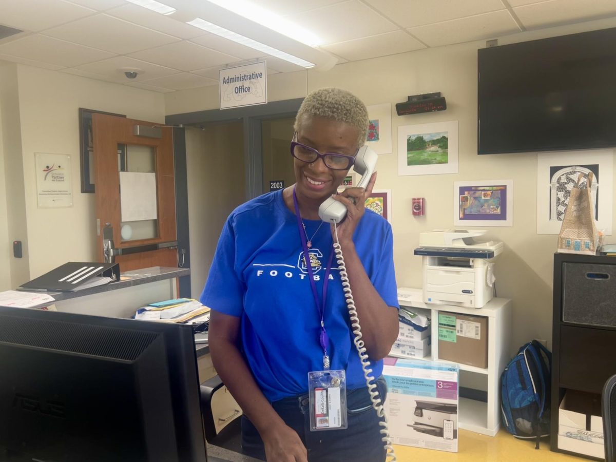 Nikki Evans working at the front desk Photo Courtesy of Noa Zilber