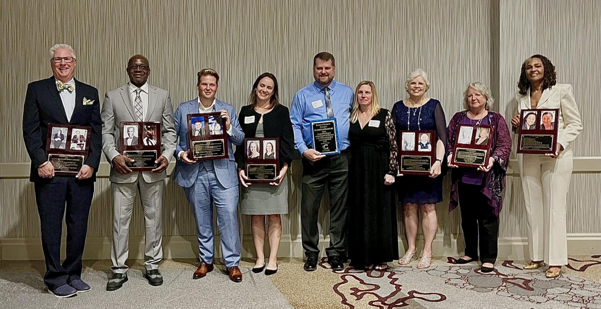 Hall of Fame Inductees (right to left):
Dr. Rochelle Lowery, Leah Jennings, 
Susan Montgomery, Stacey and Brian Fisk with the Business Champion Award, Dr. Leemis, Charlie Jabaley, 
Barry Anderson,  and Rick McDonald accepting AK Moseley’s award. Photo by Ellie Owens
