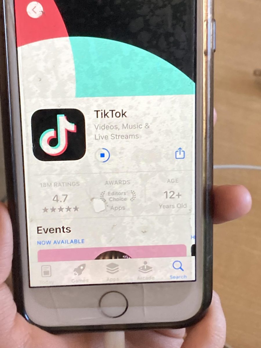 A photo of a student with TikTok on their phone (Photo courtesy of Jackson Lee)