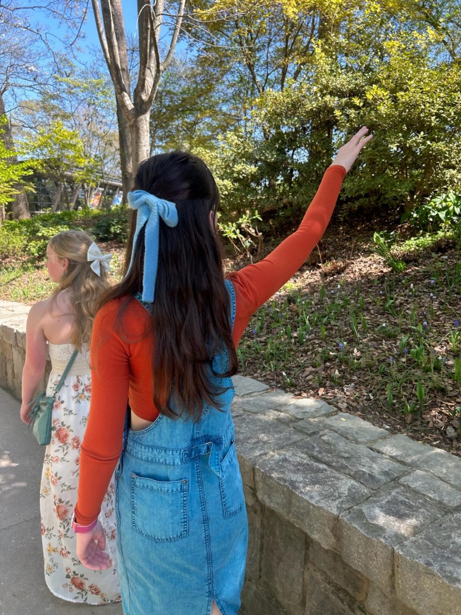 The author walking around in nature while hanging out with friends and wearing an adorable outfit (3 of the 7 steps!). Photo Courtesy of Finley Malone.
