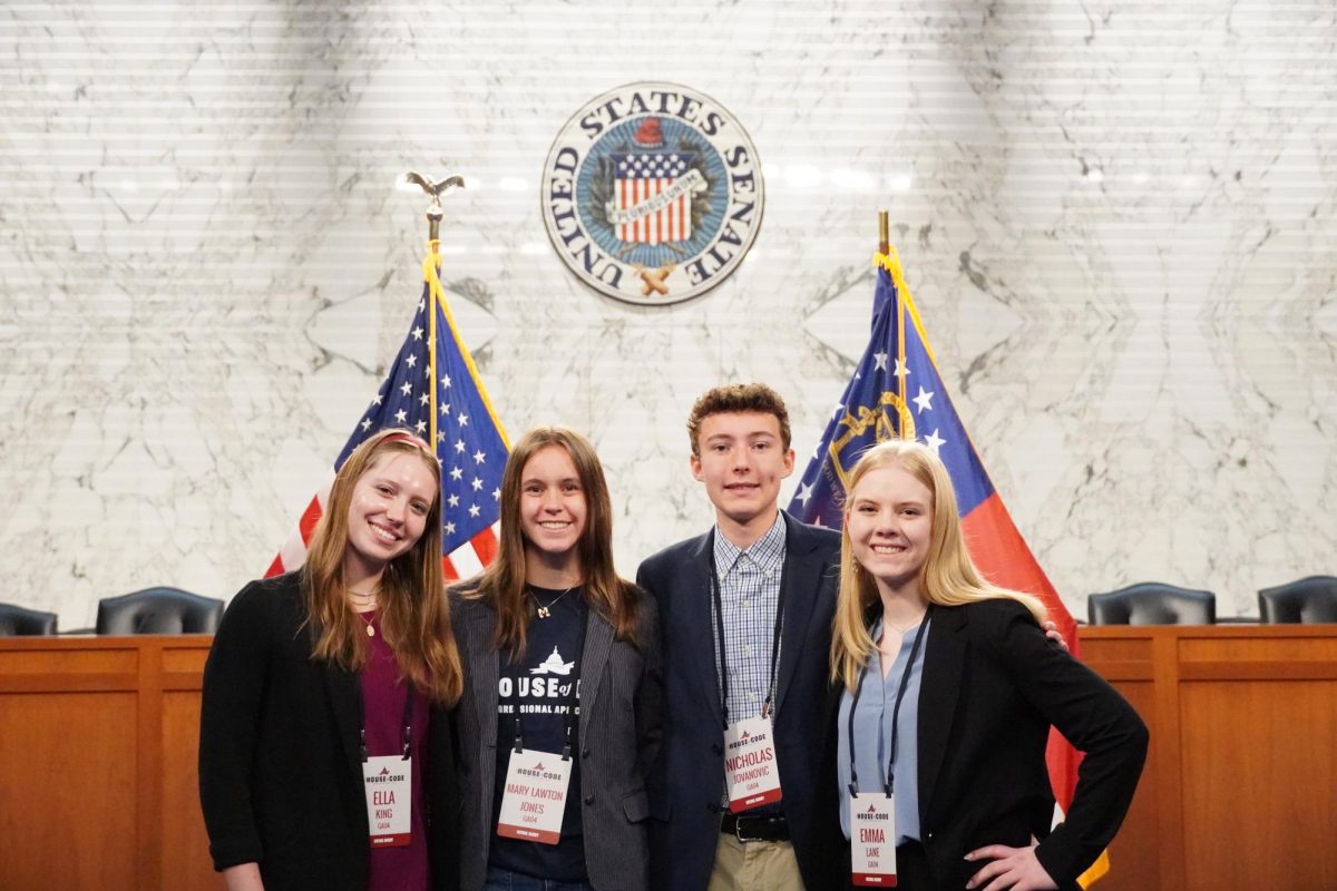 Ella King (far left), Mary Lawton Jones, Nick Jovanovic, and Emma Lane (far right) in the US Senate. Photo Courtesy of Emma Lane.