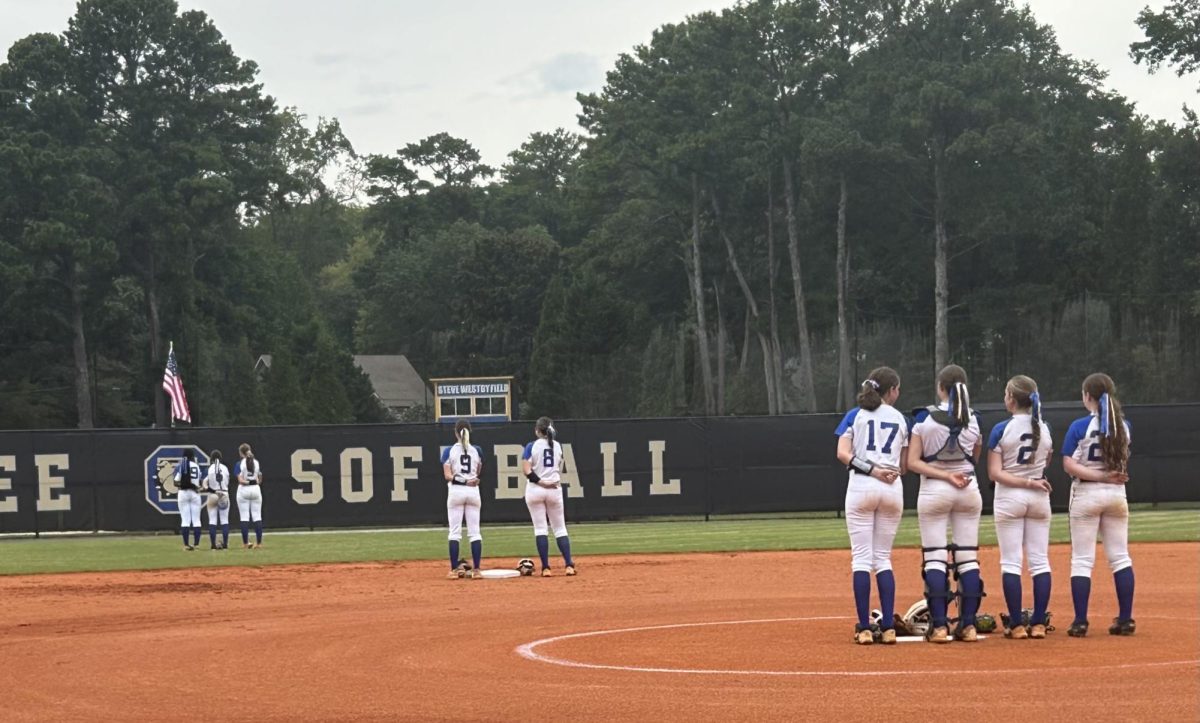 The softball team on the Chamblee Softball field. Photo by Mallory Williams.