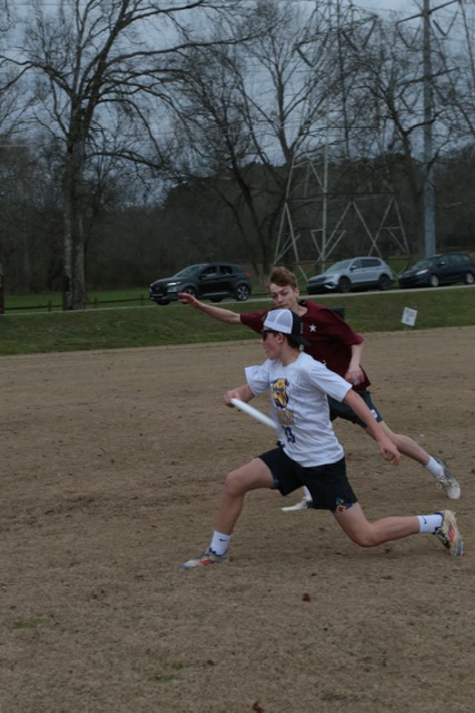 A photo of two people playing ultimate frisbee. Photo by Eli Lineberry.