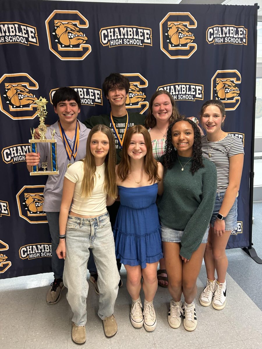 Mallory Williams ('26) and Garett Peters ('26)'s swim family at the 2025 Swim and Dive Banquet. Photo Courtesy of Mallory Williams.