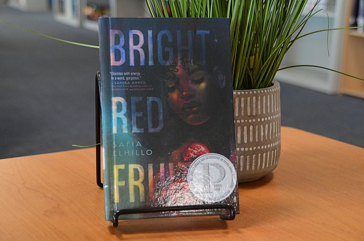 A photo of the book Bright Red Fruit by Safia Elhillo. Photo by Michael Bryant.