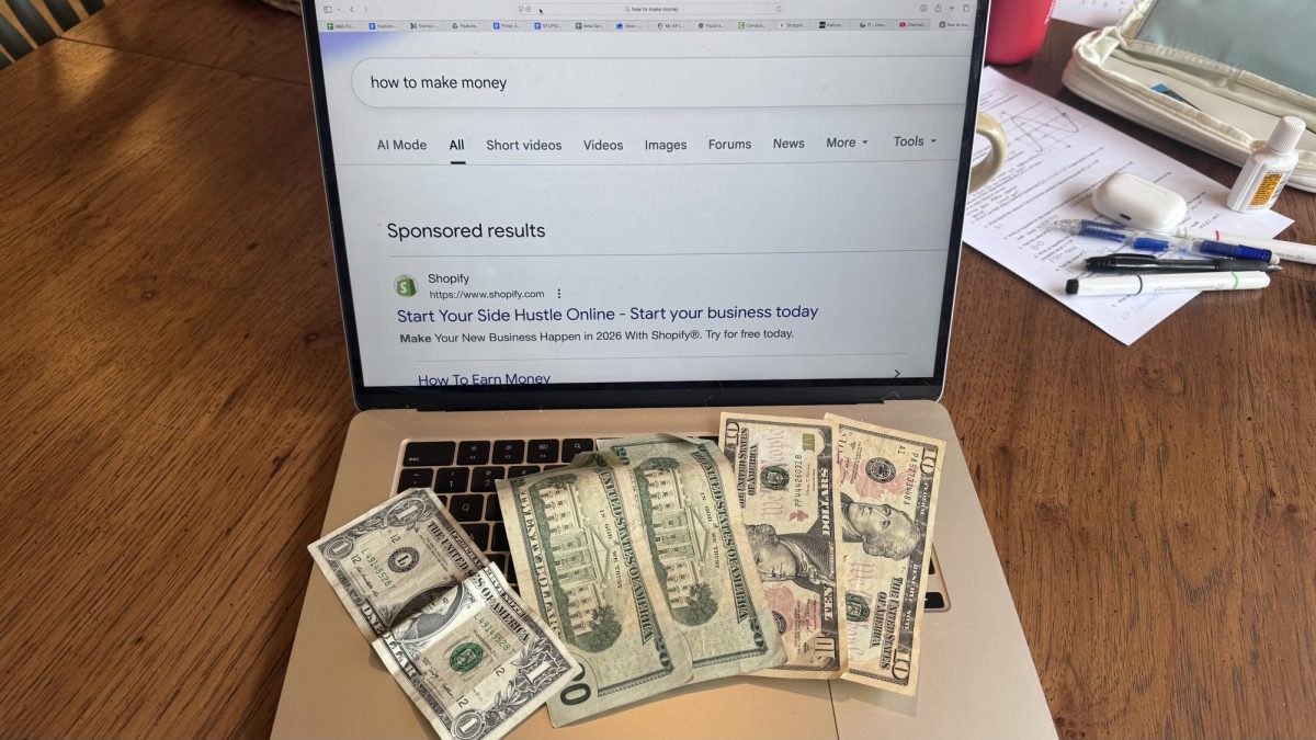 A student brainstorming how to start up a side hustle. Photo by Finley Malone.