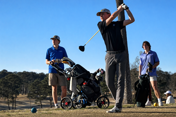 Mason Weiss ('26) at the end of a swing during a match versus Lakeside. Photo courtesy of Cooper Adamson ('28).