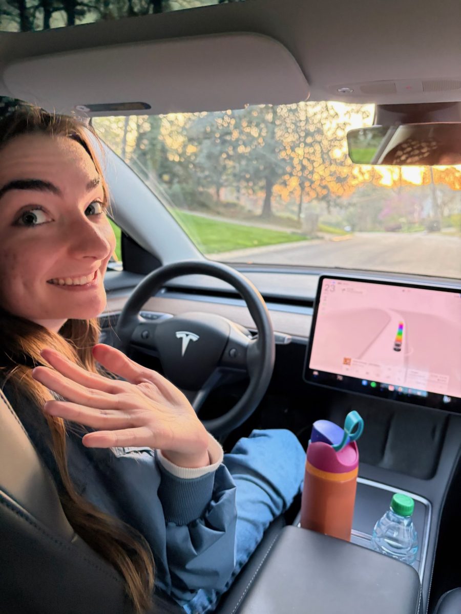Finley Malone ('26) using her Tesla's self-driving software. Photo Courtesy of Finley Malone.