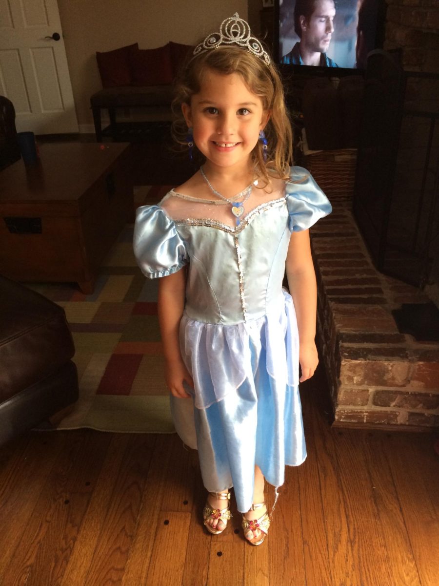 Photo of Author from childhood dressed up as her favorite Disney princess at the time: Cinderella. Photo courtesy of Rachel Belknap.
