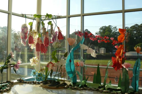 Flower artwork on display in the Fine Arts building lobby. Photo by Noa Zilber.