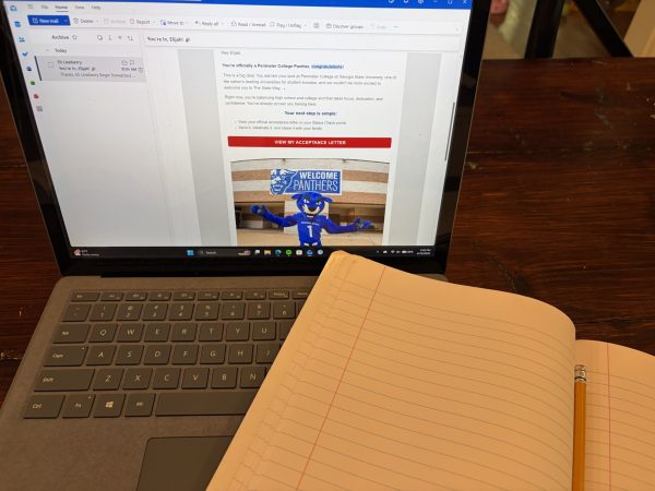 Eli prepping for Dual Enrollment after receiving his GSU acceptance email. Photo by Eli Lineberry.